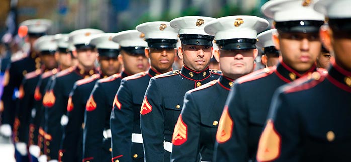 Image of line of military men in uniform for Quotacy blog Life Insurance in the Military.